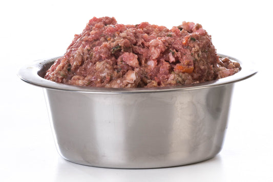 Raw dog food in bowl