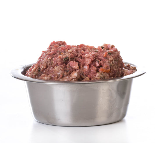 Raw dog food in bowl